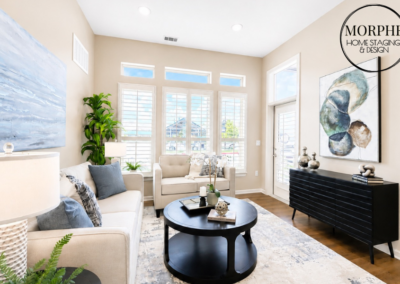 Luxury living room professionally staged by Morphe Home Staging & Design featuring neutral furnishings, layered textures, and contemporary décor designed to maximize buyer appeal in the Houston area.